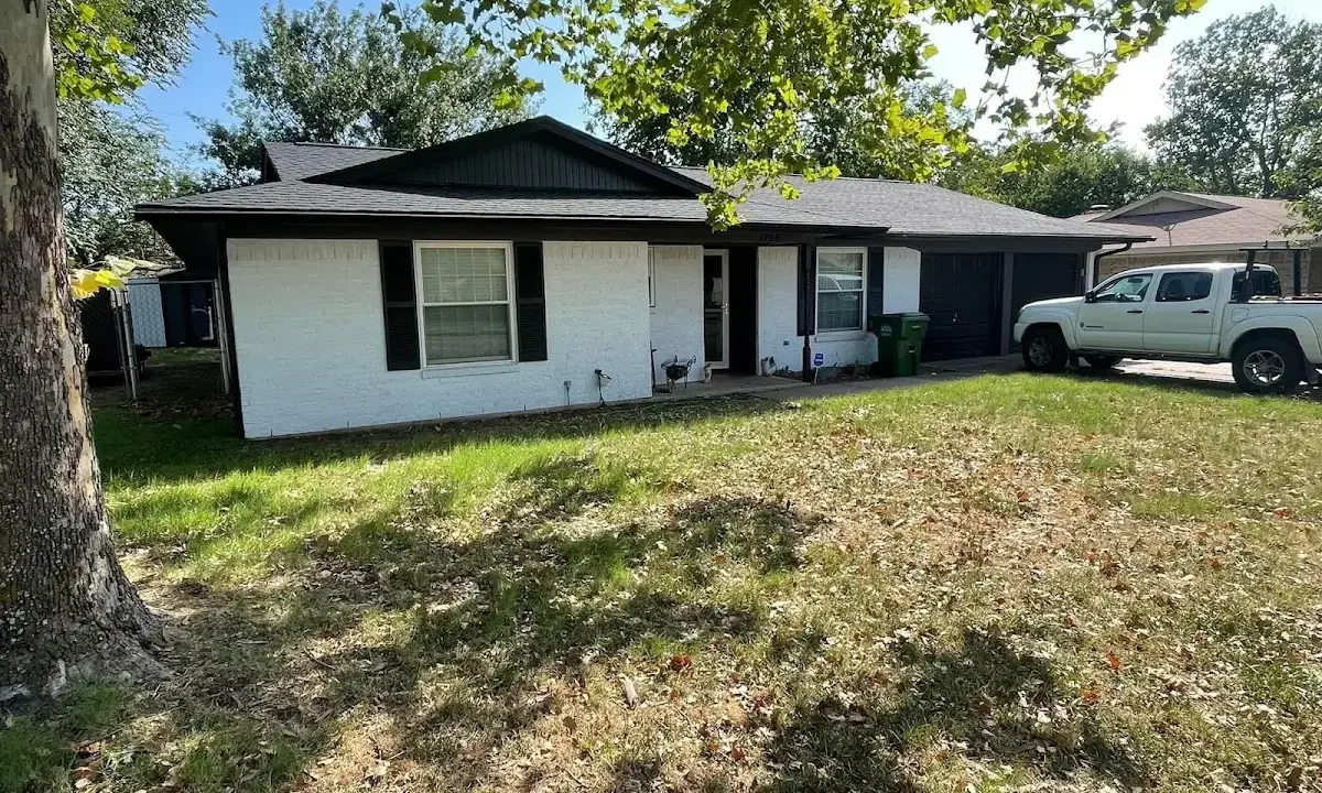 Professional roofing crew working on a residential roof in Spokane Valley